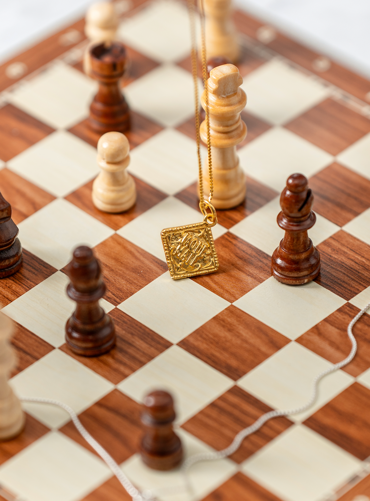 Colgante Jaque Mate